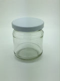 1/2lb Round Honey Jars with fancy embossed pattern to base of neck